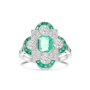 Platinum, emerald and diamond cocktail ring. - 10919