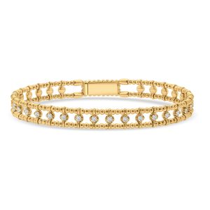 14k yellow gold diamond flexible bangle bracelet. - 10699