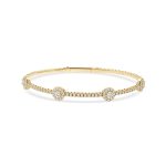 14k yellow gold flexible bangle. - 11009