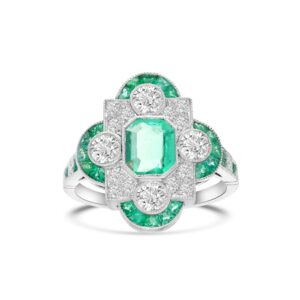 Platinum, emerald and diamond cocktail ring. - 10919