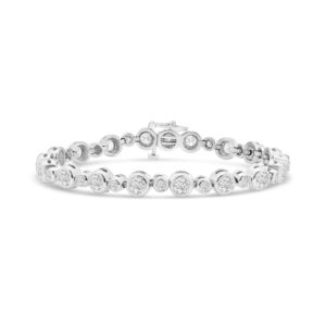 14k white gold diamond bezel set tennis bracelet. - 10924