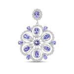 14k white gold tanzanite and diamond pendant. - 10927